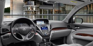 The MDX has plenty of electronic gadgets, including a rearview camera and blind-spot warning system, plus adaptive cruise control.