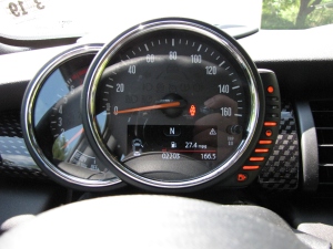 Still a monster round speedo, but it's in front of the driver now.